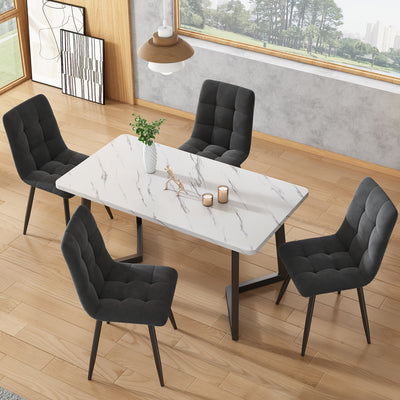 Table de salle à manger moderne avec plateau effet marbre et pieds en métal noir GILQELS