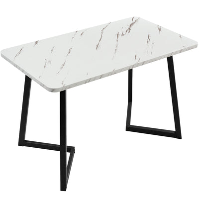 Table de salle à manger moderne avec plateau effet marbre et pieds en métal noir GILQELS
