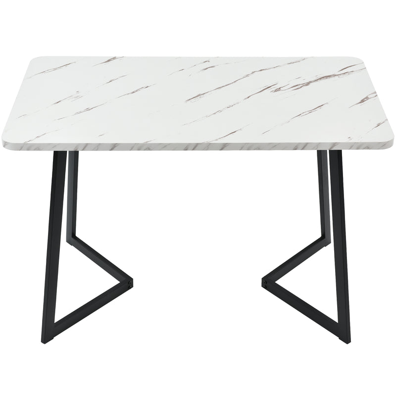 Table de salle à manger moderne avec plateau effet marbre et pieds en métal noir GILQELS