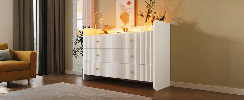 Buffet Blanc Ondulé Moderne avec Éclairage LED Multicolore et 6 Tiroirs Spacieux TRAGVAX